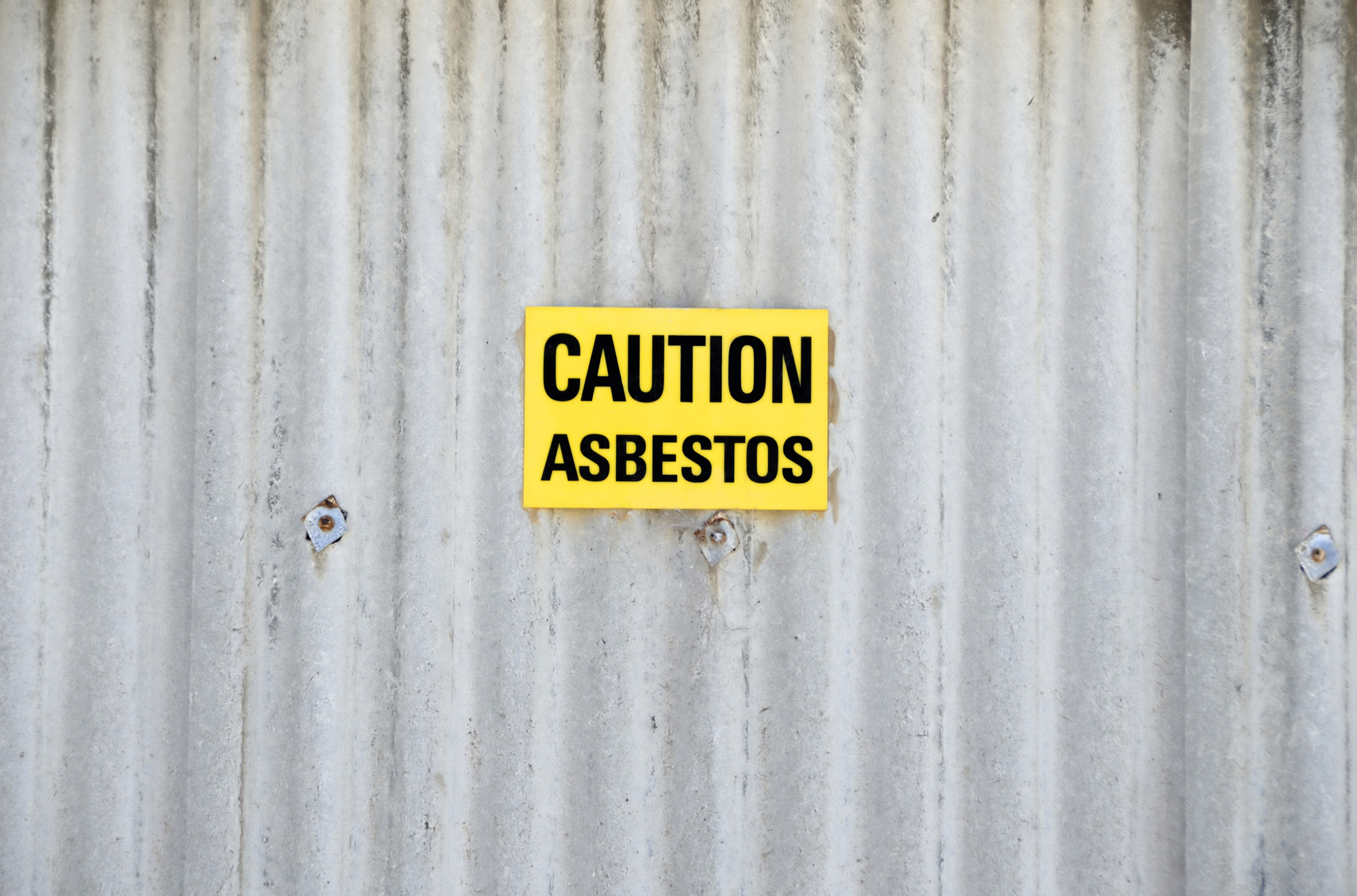 Sign with warning for asbestos