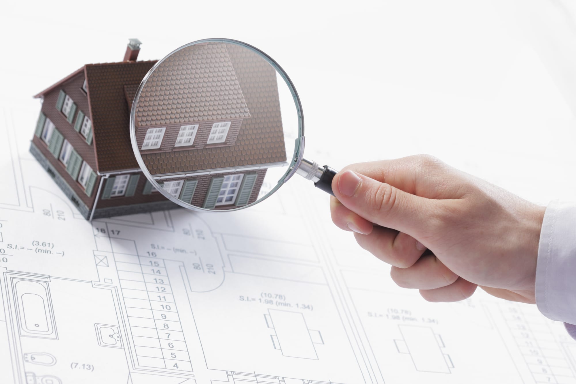 Magnifying glass and house. Magnifying glass and house.